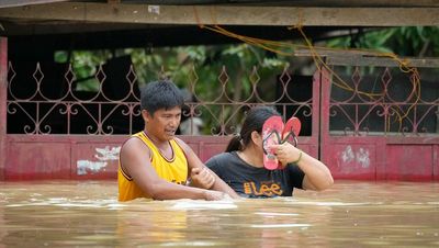 Powerful typhoon leaves five rescuers dead in north Philippines