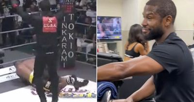 Floyd Mayweather caught smirking as his bodyguard is KO'd by kickboxer