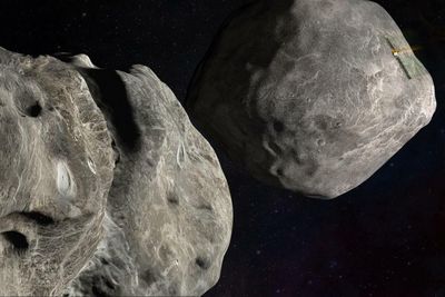 ‘Basically a bullseye’: Nasa crashes spacecraft into asteroid to test Earth’s defenses – as it happened