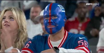 A sad Giants fan with a painted helmet face became the perfect meme for New York fans
