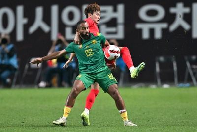 Son's header lifts South Korea past Cameroon