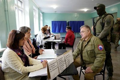 Occupied regions of Ukraine vote to join Russia in staged referendums