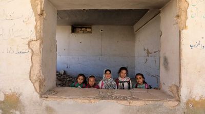 Children Return to Bombed-Out School in Syria Frontline Town