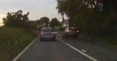 The terrifying moment Jaguar driver nearly causes crash with dangerous overtake