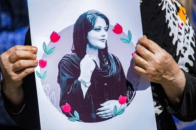 Iranians take to streets for 12th night of women-led protests