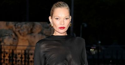 Kate Moss commands attention in glam black mini and faux fur coat for YSL's PFW show