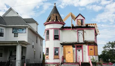Well-known West Side house staying, but distinctive pink trim is going