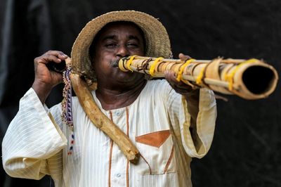 Sudan traditional wind instrument trumpets harvest time