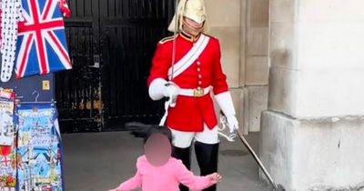 King's Guard SHOUTS at little girl to move out of the way as she bursts into tears