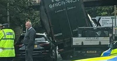 Lorry crashes into bridge in Edinburgh as police forced to close road