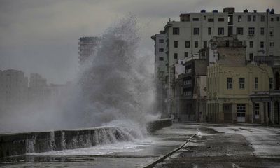 ‘We’re natural fighters’: Cubans brave sweeping power cuts in Hurricane Ian aftermath