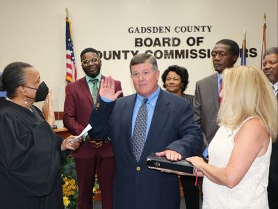 Florida official appointed by DeSantis resigns after KKK costume photo emerges