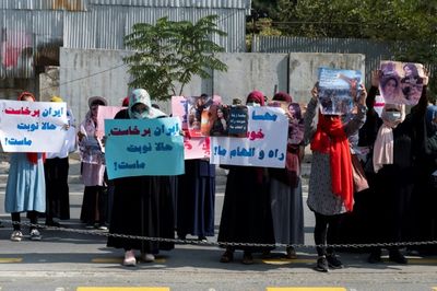 Taliban fire into air to disperse women's rally backing Iran protests