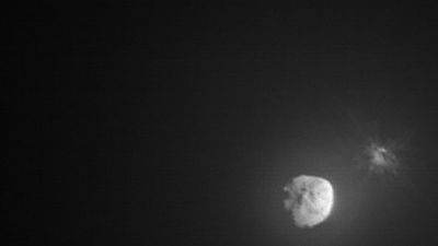 How NASA's asteroid basher's companion satellite snapped the cosmic crash