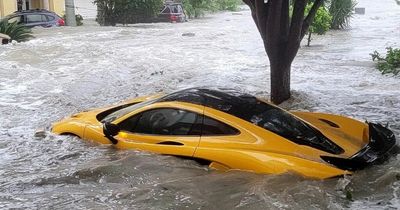 Hurricane Ian washes man’s brand new McLaren supercar down street during floods