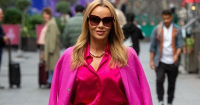 Amanda Holden shows off her curves in pink suit after complaining about bloated stomach