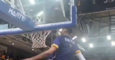 Basketball wonderkid tipped for NBA success headbutts rim in bizarre pre-game ritual