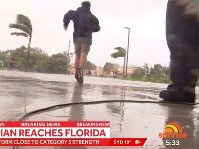 Australian cameraman jumps into action to help Floridians flee Hurricane Ian’s fierce winds and rising waters