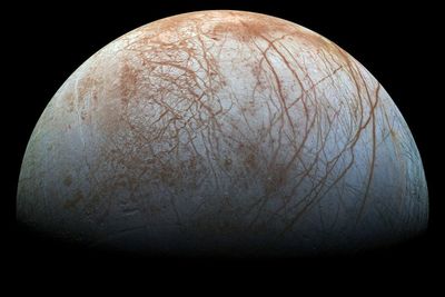 NASA spacecraft buzzes Jupiter moon Europa, closest in years