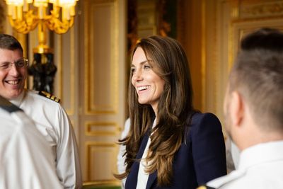 Kate all smiles as she meets Royal Navy sailors at Windsor Castle