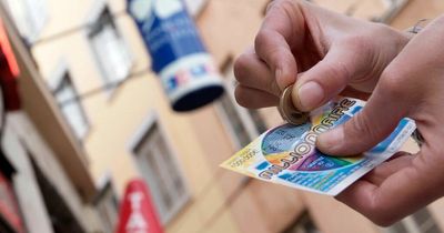 Woman wins €500,000 on scratch card but shop owner flees with her ticket