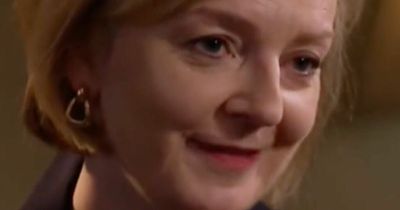 Grinning Liz Truss says it's not her job to give mortgage advice as budget causes chaos