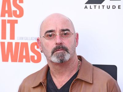 Oasis guitarist Bonehead given cancer all-clear: ‘Into recovery now and see you all soon’