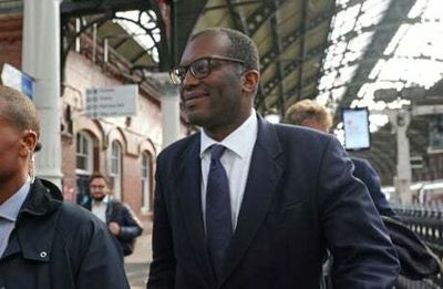 Kwasi Kwarteng appeals for Tory unity as poll gives Labour 33-point lead