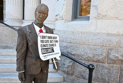 Activists made a Ron Johnson poop statue