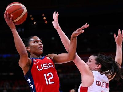 US thrash Canada, into basketball WC final