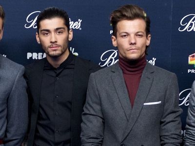 ‘You’d have to ask him’: Louis Tomlinson claims he’s unsure whether he’s friends with Zayn Malik