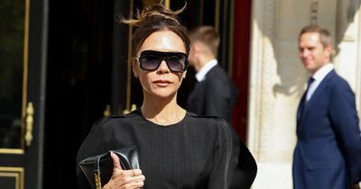 Victoria Beckham cuts glum figure as Brooklyn's appearance at her fashion show is unclear