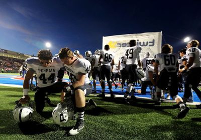 AP-NORC poll: On game day, some see prayer as a Hail Mary