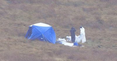 Police pictured digging for Moors murder victim Keith Bennett after reports skull found
