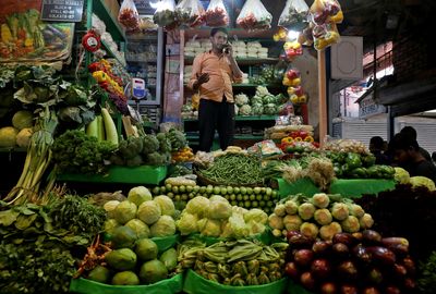 India’s central bank hikes interest rates to tame inflation