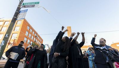 Street sign unveiled for Honorary Karen Lewis CTU Way in front of teachers union headquarters
