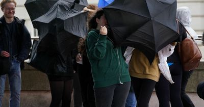 UK battered by heavy rain and gales with 94mph gusts from Hurricane Ian's impact