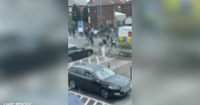 Moment violence erupts as football hooligans involved in mass brawl ahead of match