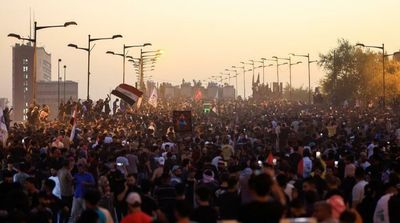 Tear Gas Fired, Scores Wounded in Baghdad Rally Marking 2019 Protests