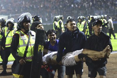 Hundreds killed, hurt in stampede at Indonesia football match