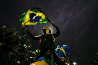 Brazil election goes to runoff as Bolsonaro outperforms polls