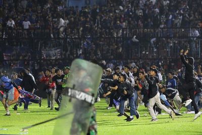 At least 174 people reportedly dead after stampede at Indonesian football match