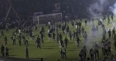 Indonesian football match stampede death toll hits 174, with fears it will rise further
