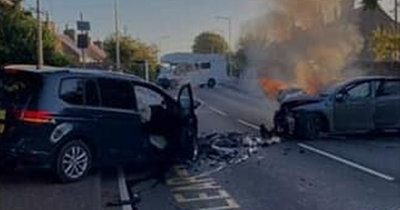 Busy Scots road closed as car bursts into flames during horror two vehicle smash