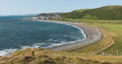 Welsh beach walker believes he just found a huge haul of 'pure cocaine' washed up in 30 black bags