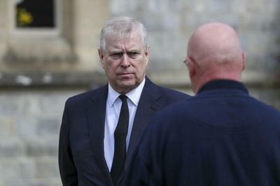 Two men charged over 'assault' on Prince Andrew heckler