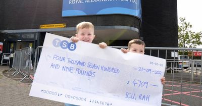 Grieving children of young dad hand over cheque to "unforgettable" hospital staff
