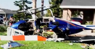 Helicopter crashes in front garden of house after spiralling out of control