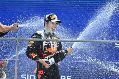 Perez wins in Singapore rain as Verstappen made to wait for title