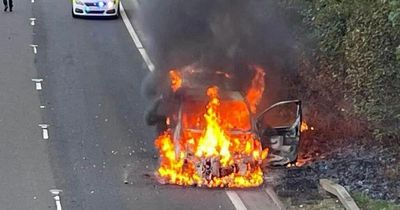 Car ravaged by flames on busy Ayrshire road as emergency crews rush to fight blaze